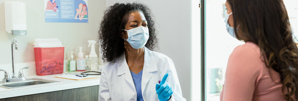 doctor checking woman