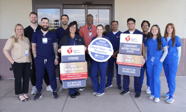 Recognition for heart attack care, team posing for photo