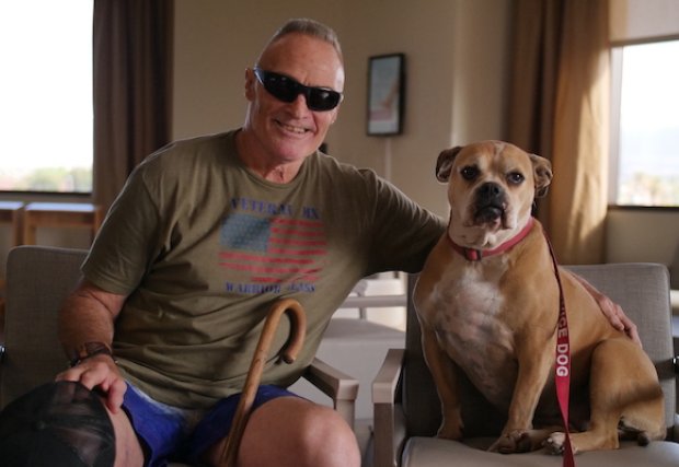 Patient and Veteran Kipp Petry, with service dog Maggie