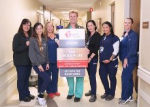 Recognition for stroke care, team posing for photo
