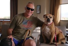 Patient and Veteran Kipp Petry, with service dog Maggie