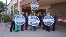 SWH Temecula valley staff posing with Platinum Performance Achievement Award badges