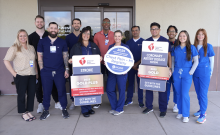 Recognition for heart attack care, team posing for photo