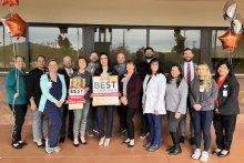 Staff at Temecula Valley Hospital receiving the best hospitals for patient safety award