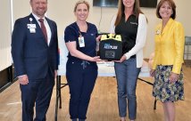 SWH Temecula and Michelle's Place staff posing with donated AED