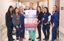 Recognition for stroke care, team posing for photo