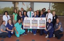 SWH temecula staff posing with GWTG banner.
