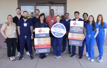 Recognition for heart attack care, team posing for photo